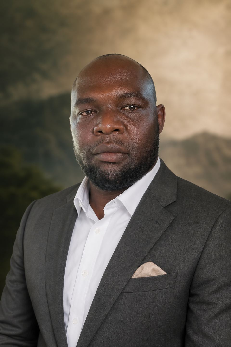Gerald Tengekyon in a charcoal suit
